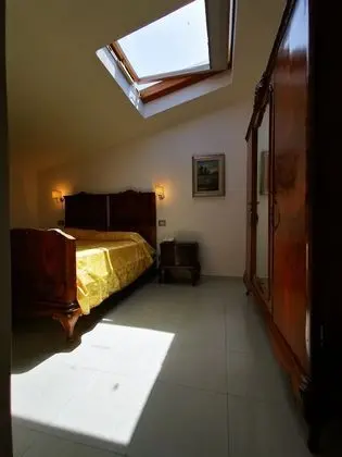 Mansarda con letto matrimoniale o 2 letti singoli, 1 camera da letto
