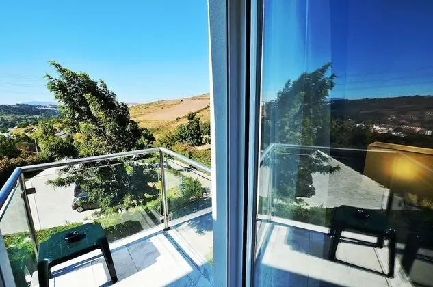 Üç Kişilik Oda, Balkon