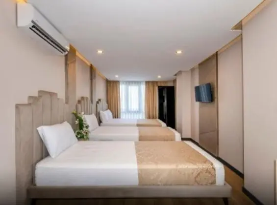 Deluxe Triple Room
