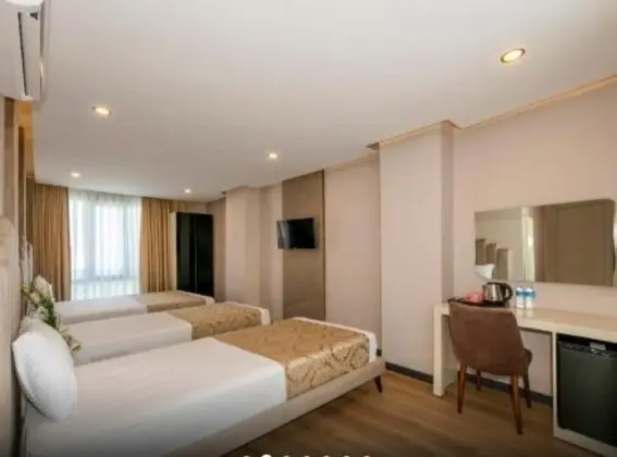 Deluxe Triple Room