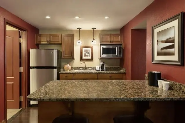 Suite, 1 King Bed, Separate Living Area, Hearing Accessible (Hickory Suite)