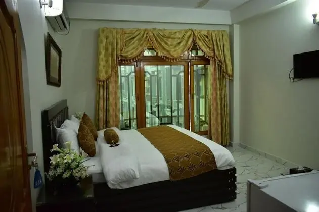 Deluxe Tek Büyük veya İki Ayrı Yataklı Oda