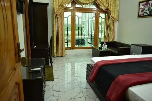 Deluxe Tek Büyük veya İki Ayrı Yataklı Oda