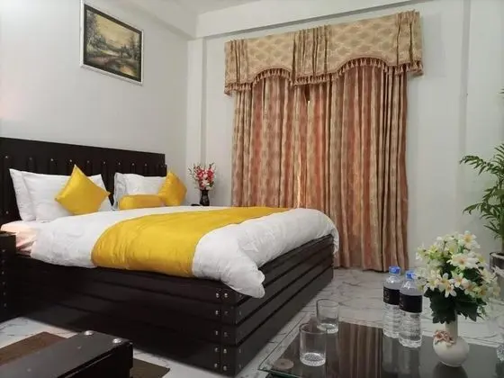 Deluxe Tek Büyük veya İki Ayrı Yataklı Oda