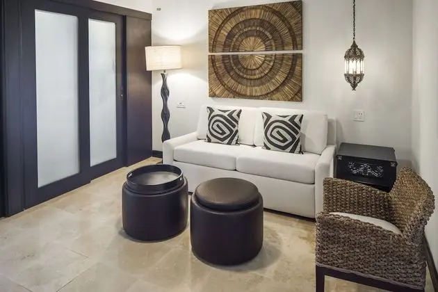 Junior King Suite with Partial Pool View and Balcony