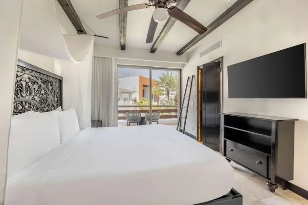 One Bedroom Deluxe King Suite with Pool View and Balcony