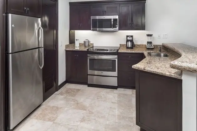 One Bedroom Deluxe King Suite with Pool View and Balcony