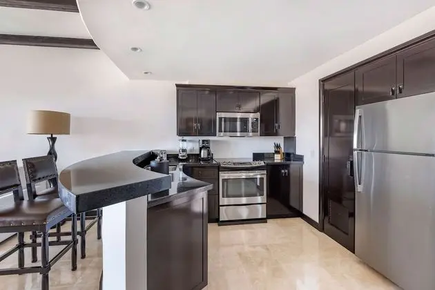 One Bedroom Deluxe King Suite with Pool View and Balcony