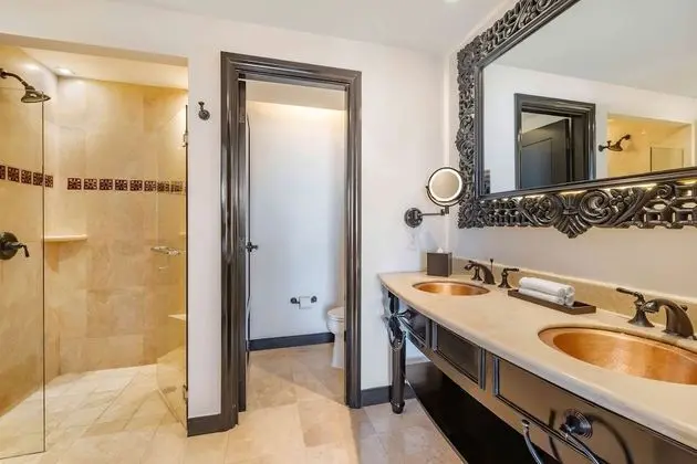 One Bedroom Deluxe King Suite with Pool View and Balcony