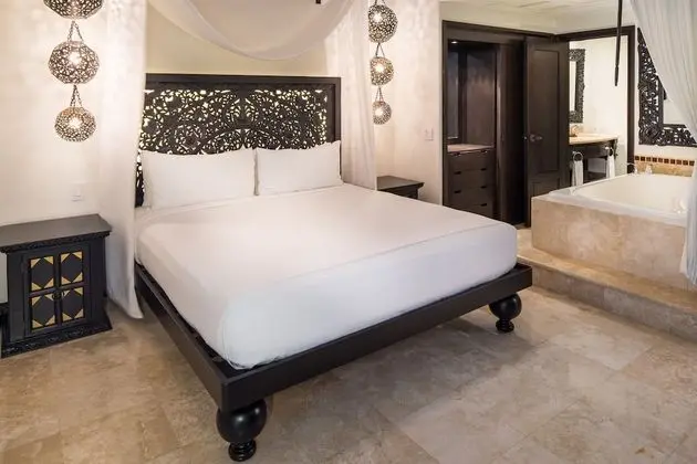 Two Bedroom Deluxe with Pool View and Balcony
