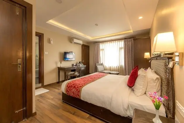 Deluxe Tek Büyük veya İki Ayrı Yataklı Oda