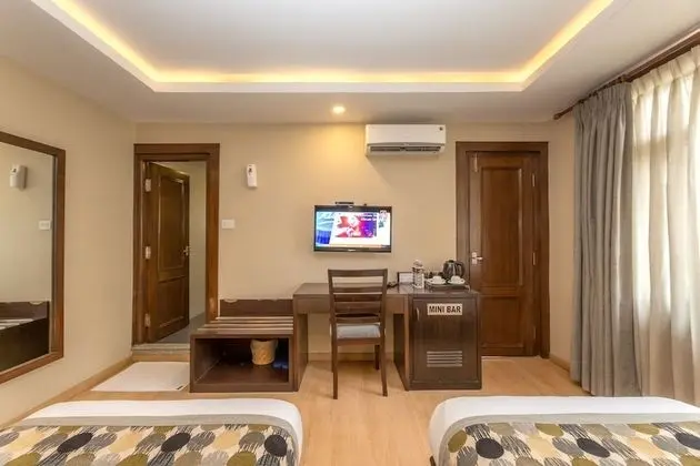 Deluxe Tek Büyük veya İki Ayrı Yataklı Oda