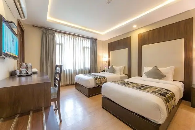 Deluxe Tek Büyük veya İki Ayrı Yataklı Oda