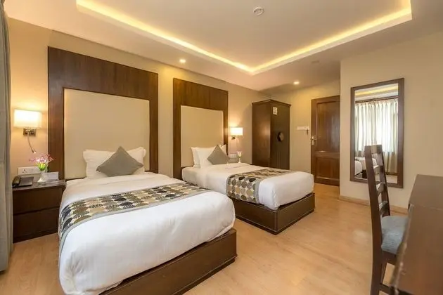 Deluxe Tek Büyük veya İki Ayrı Yataklı Oda