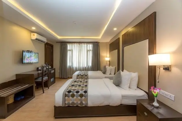 Deluxe Tek Büyük veya İki Ayrı Yataklı Oda