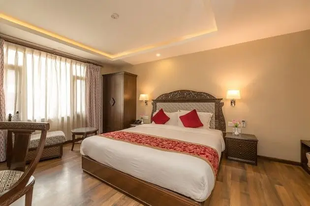 Deluxe Tek Büyük veya İki Ayrı Yataklı Oda