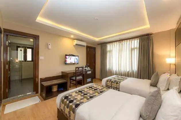 Deluxe Tek Büyük veya İki Ayrı Yataklı Oda