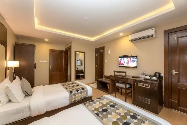 Deluxe Tek Büyük veya İki Ayrı Yataklı Oda