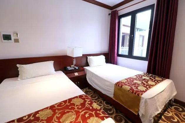 Deluxe Tek Büyük veya İki Ayrı Yataklı Oda