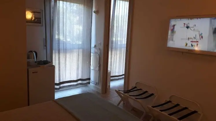 Tek Büyük veya İki Ayrı Yataklı Oda, Bahçe Manzaralı