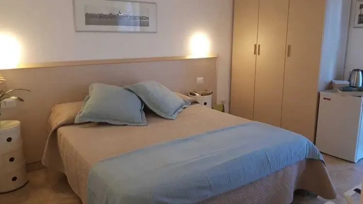 Tek Büyük veya İki Ayrı Yataklı Oda, Bahçe Manzaralı