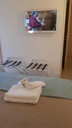 Tek Büyük veya İki Ayrı Yataklı Oda, Bahçe Manzaralı