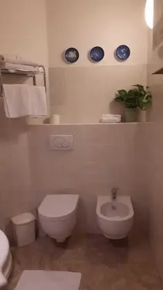 Tek Büyük veya İki Ayrı Yataklı Oda, Bahçe Manzaralı