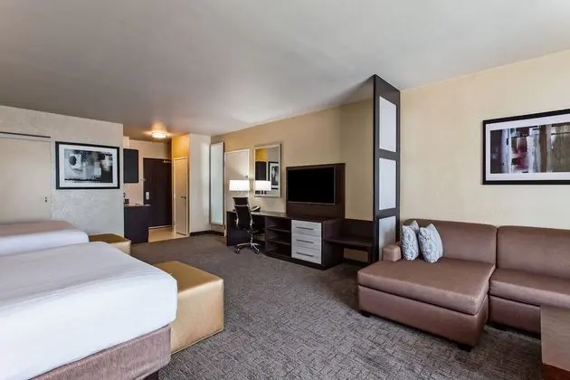 Suite, 2 Queen Beds with Sofa Bed (Living and Dining Area)