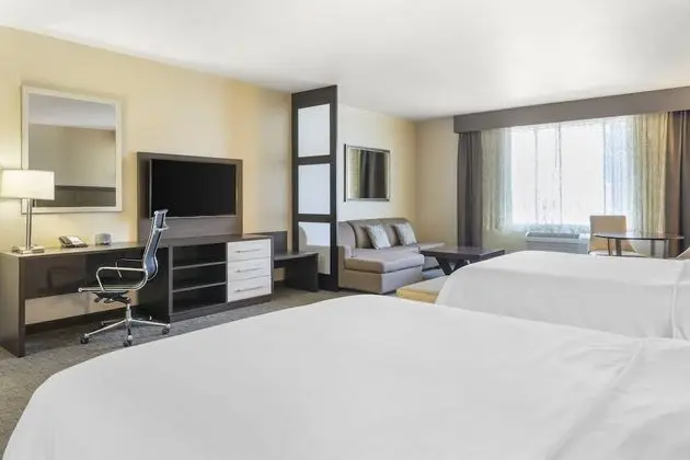 Suite, 2 Queen Beds with Sofa Bed (Living and Dining Area)