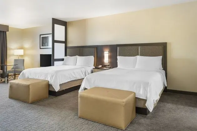 Suite, 2 Queen Beds with Sofa Bed (Living and Dining Area)