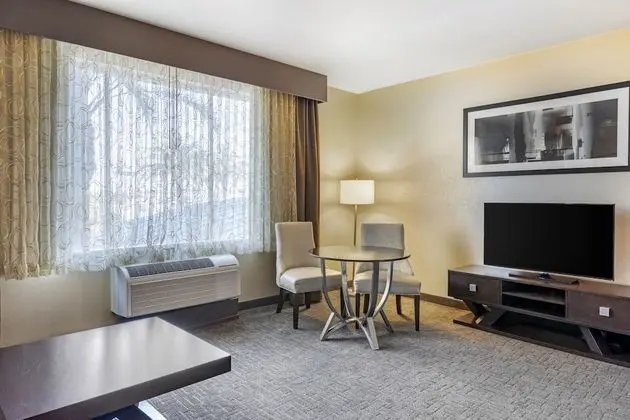 Suite, 2 Queen Beds with Sofa Bed (Living and Dining Area)