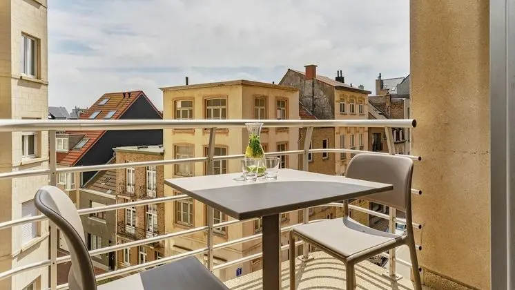 Essential Suite - 4p | Sleeping corner - Sofa bed | Balcony - City view