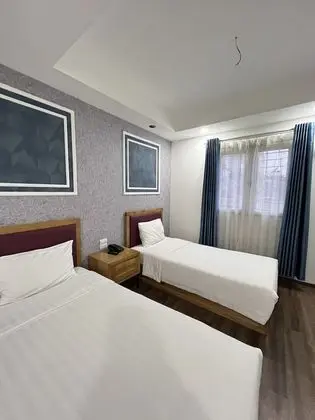 Deluxe Tek Büyük veya İki Ayrı Yataklı Oda