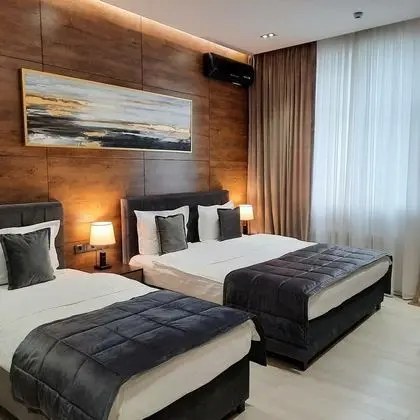 Deluxe Üç Kişilik Oda