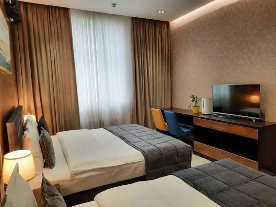 Deluxe Üç Kişilik Oda