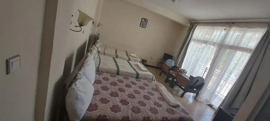 Üç Kişilik Oda