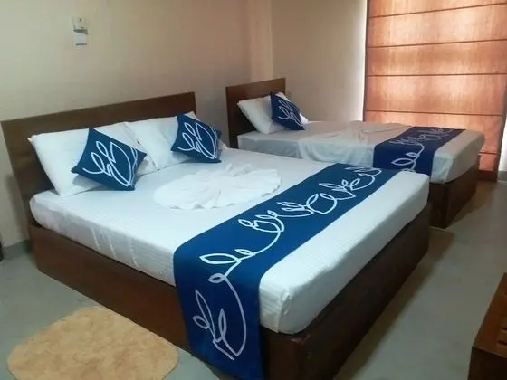 Deluxe Üç Kişilik Oda, Birden Çok Yatak, Sigara İçilmez, Bahçe Manzaralı