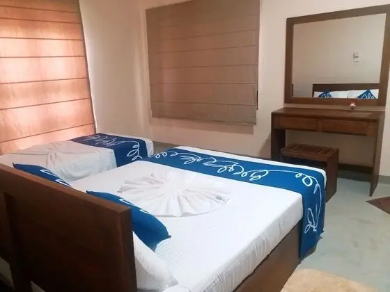 Deluxe Üç Kişilik Oda, Birden Çok Yatak, Sigara İçilmez, Bahçe Manzaralı