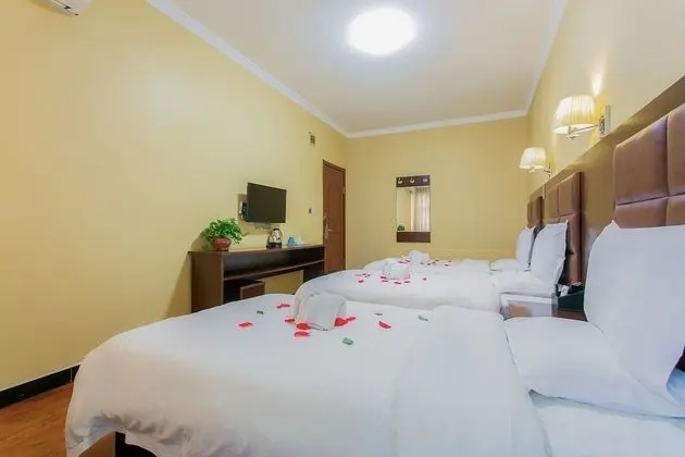 Deluxe Üç Kişilik Oda