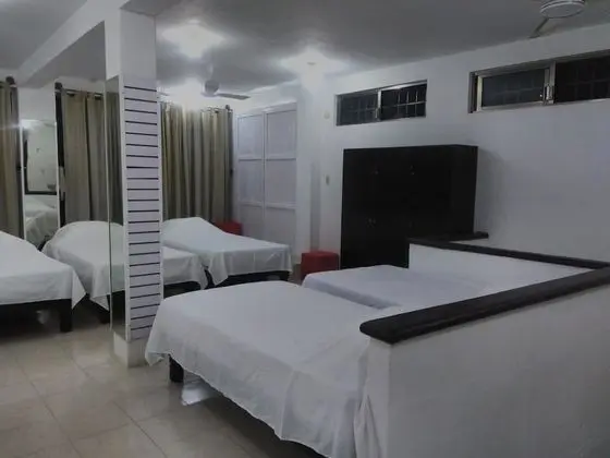 Dormitorio compartido, camas individuales