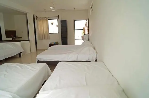 Dormitorio compartido, camas individuales