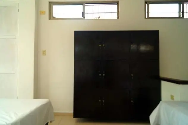 Dormitorio compartido, camas individuales