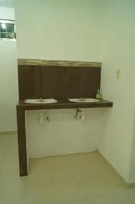 Dormitorio compartido, camas individuales