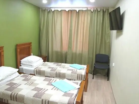 Tek Büyük veya İki Ayrı Yataklı Oda, Ortak Banyo