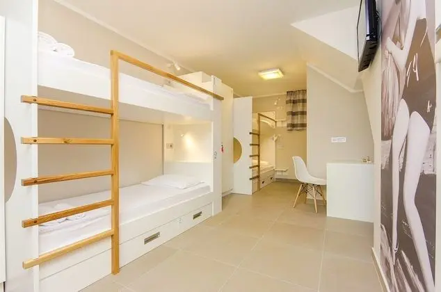 Bed in 4-Bed Dormitory Room with Private Bathroom