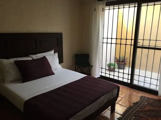 One double and single Bed Private Bathroom  with AC, & Fan