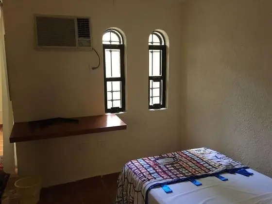 One double and single Bed Private Bathroom  with AC, & Fan