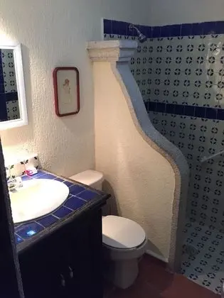 Two Individuals Beds with AC & Fan Shared Bathroom