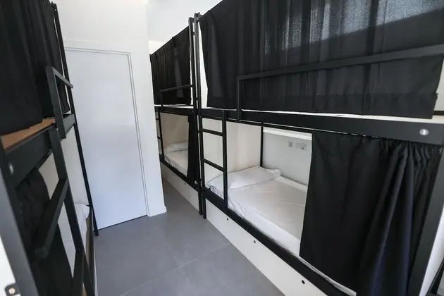 1 cama en habitación compartida de 8 camas, baño privado