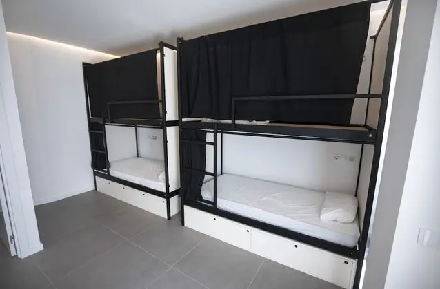 1 cama en habitación compartida de 8 camas, baño privado